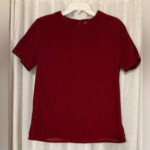 Deep red/ burgundy colored top. Soft velvety material. Sz. S